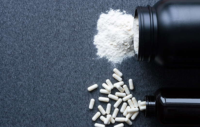 jars with nutritional supplements for bodybuilding
