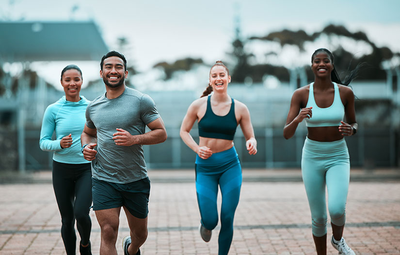 Shot of a group of friends hanging out before working out together