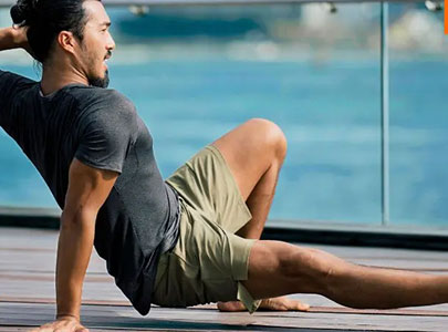 Trainer Assisting Client